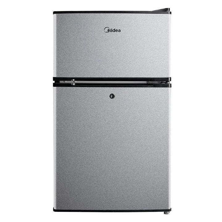 Inside Midea 120 litre refrigerator showing adjustable shelves and compartments